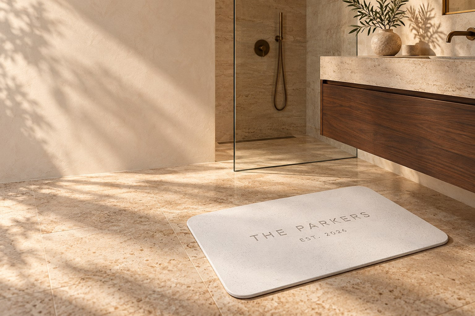 White stone mat engraved with The Parkers in a minimalist bathroom, design illustration
